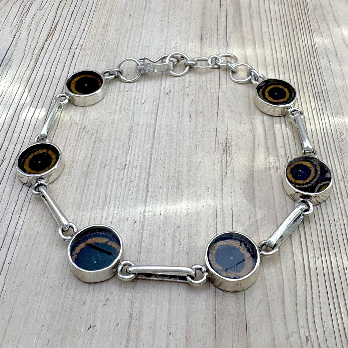 Bracelet Aelya Rond Brun ambré en argent et ailes de papillon