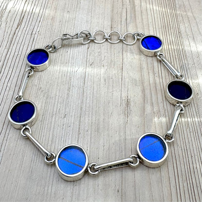 Bracelet Aelya Rond Bleu profond en argent et ailes de papillon