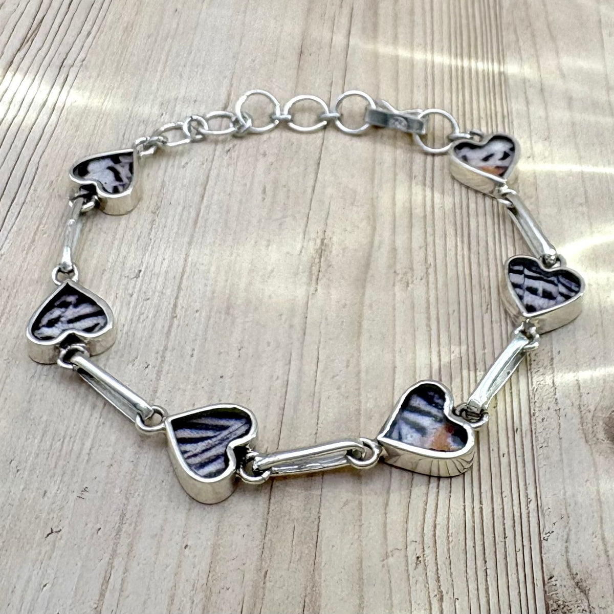 Bracelet Aelya Cœur brun nacre en argent et ailes de papillon