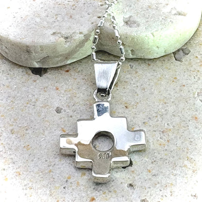 Revers du pendentif Chakana en argent avec bélière et finition artisanale