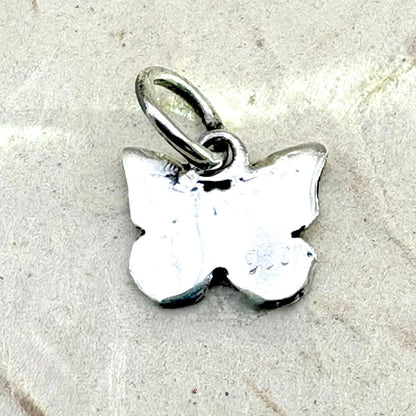 Revers du pendentif Papillon Ombre en argent avec finition artisanale